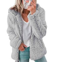 Damen Teddyjacke grau, flauschig, Kapuze, Reißverschluss, Wintermode, lässig, warm.