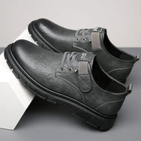 Graue Herrenschuhe aus Leder, rutschfeste Sohle, modisch, bequem, ideal für Business und Freizeit.