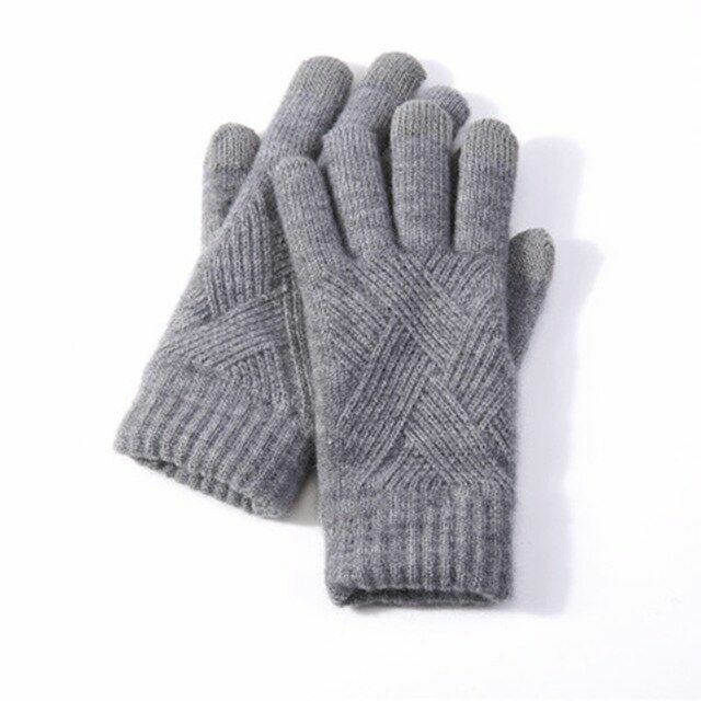 Graue Strickhandschuhe aus Wolle, warm, winterfest, modisches Accessoire für kalte Tage.