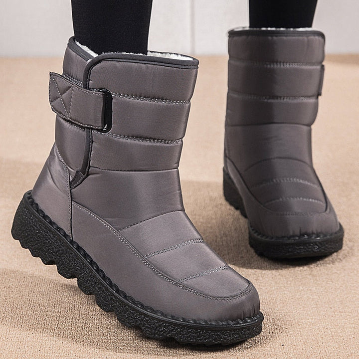Graue Winterstiefel Damen, wasserdicht, warm gefüttert, rutschfeste Sohle, modisch.