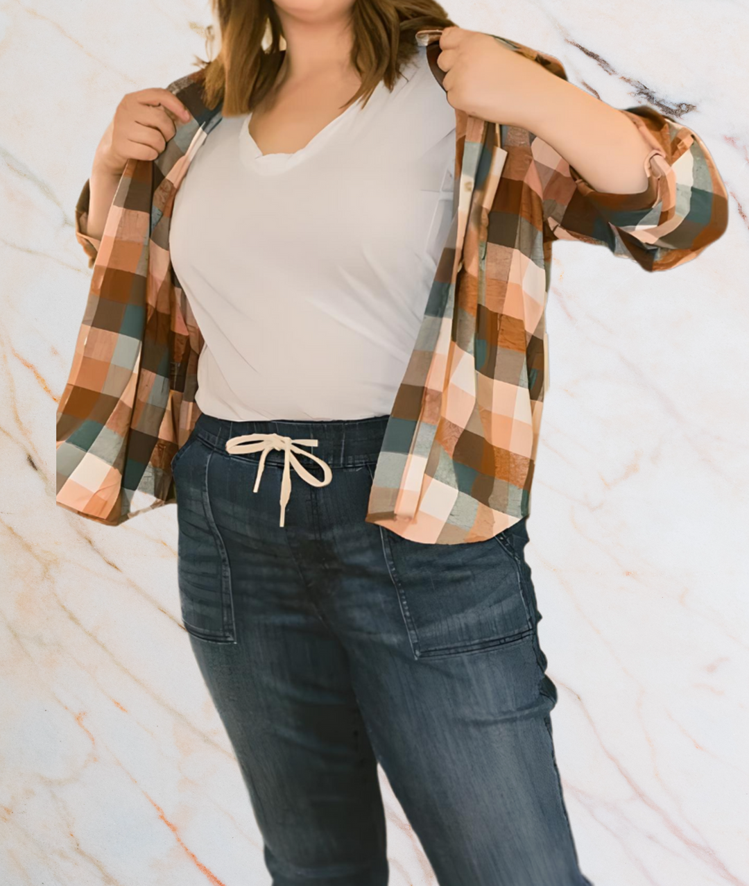 Frau in kariertem Hemd und Jeans, lässige Mode, Freizeitkleidung, Herbstoutfit, Damenmode.