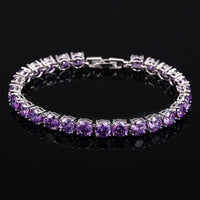 Silbernes Armband mit lila Zirkonia-Steinen, eleganter Schmuck, Damenaccessoire, Geschenkidee.
