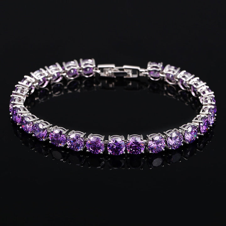 Silbernes Armband mit lila Zirkonia-Steinen, eleganter Schmuck, Damenaccessoire, Geschenkidee.